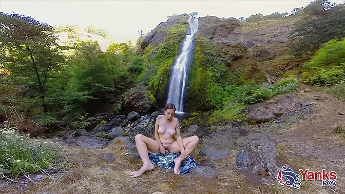 Solo hiker toys her pierced nipple and wets her pussy with a dildo