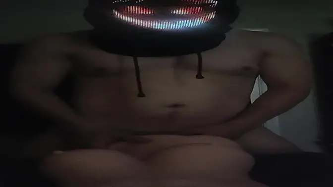 Solo masked hunk with big cock wanks it on a rainy day