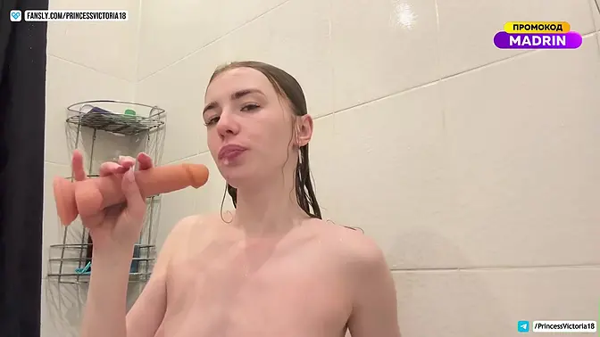 Steamy shower BJ leads to a redheaded nymph's explosive orgasm