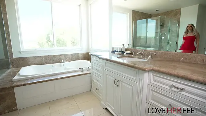 Stephanie Love teases with her big tits and feet