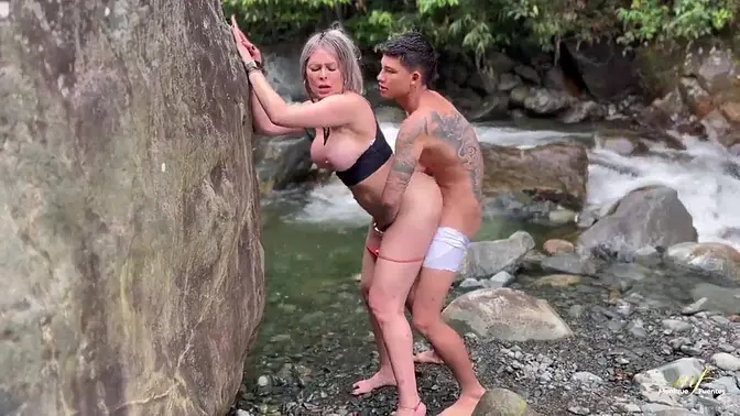 Stepson seduces stepmom in secluded river setting
