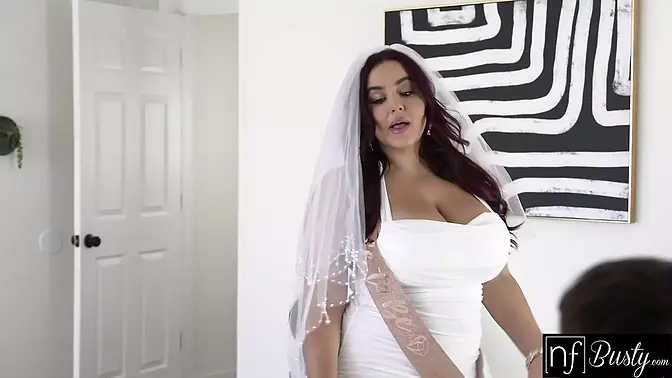 Stunning busty model of the year shows off big tits before night wedding