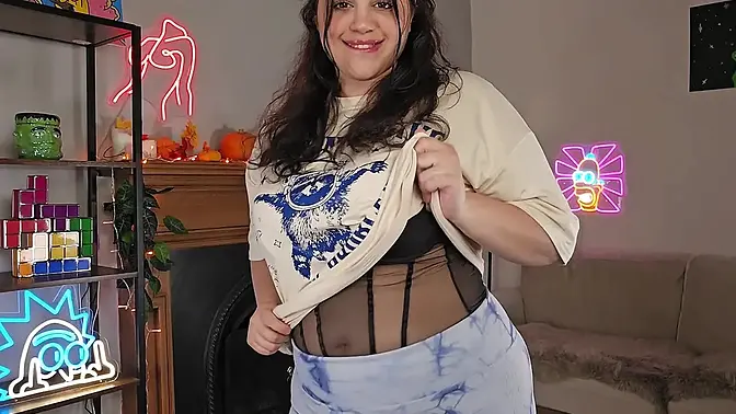 Sultry Latina in yoga pants teases and shows off big natural tits