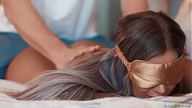 Tattooed blonde Hayley Davies teases with footjob and handjob