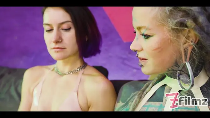 Tattooed girl Anuskatzz gapes her ass with a double steel dildo