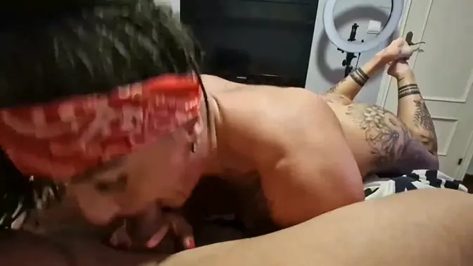 Tattooed MILF deepthroats and rims cock