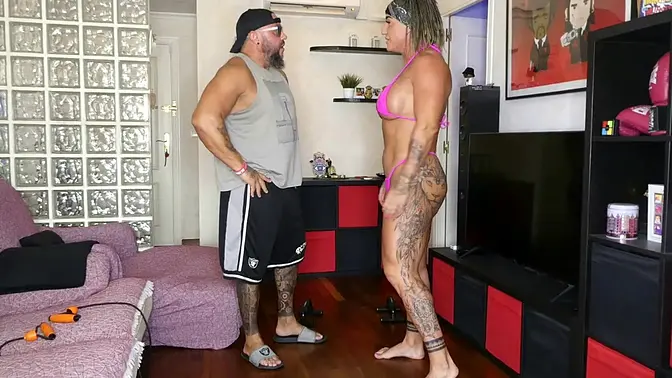 Tattooed muscle man takes on big-titted, big-clitted woman