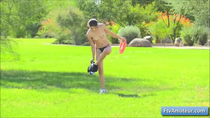 Teen cutie plays with toys in public