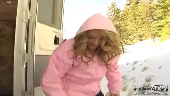 Teen slut flashes her tits and shows off her big cock outside in the snow