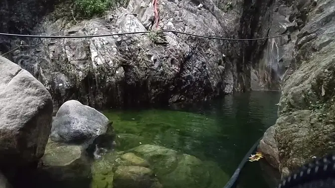 Tiny nude girl caught exposing herself near a waterfall