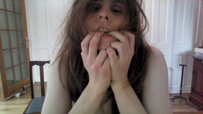 Transgender amateur strips off layers while teasingly warming chilly feet 