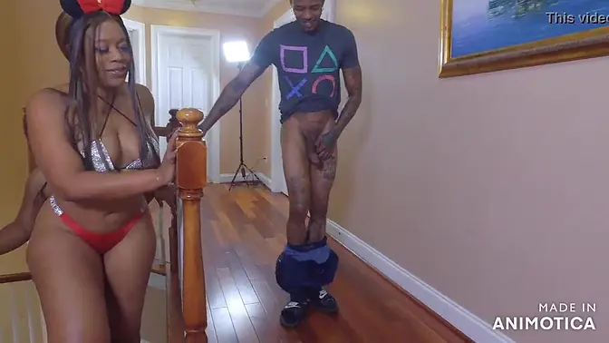 Two ebony beauties share a big black cock in a steamy threesome