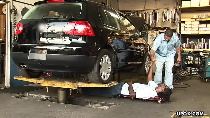 Two ebony whores share a massive black cock