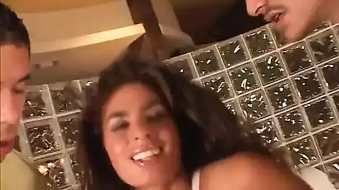 Two guys penetrate hot Latina in doggy style