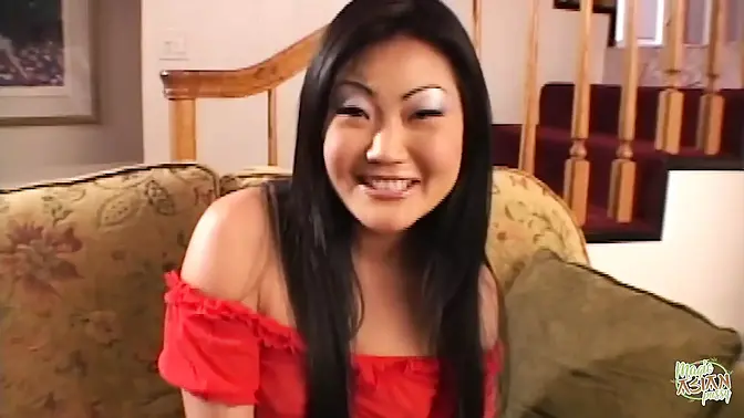 Two hot babes stuff Asian slut's pussy in threesome