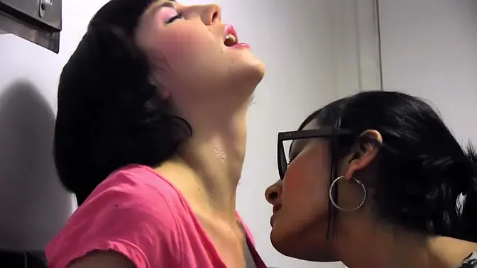 Two hot brown-haired lesbians play with each other