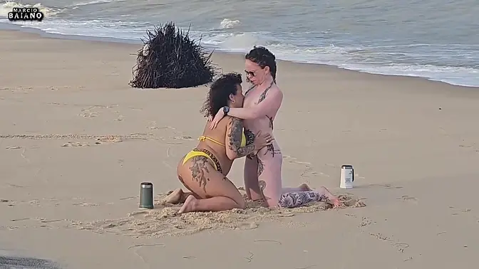Two pretty lesbian chicks playing on the beach get picked up by a tourist and have their asses fucke