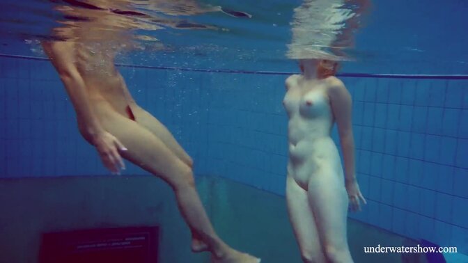 Two sexy babes show off their bodies at the pool