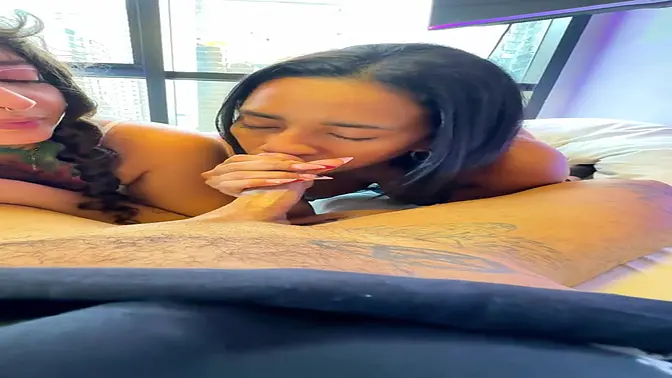 Two vixens eagerly sniff his throbbing cock at daring fetish fiesta