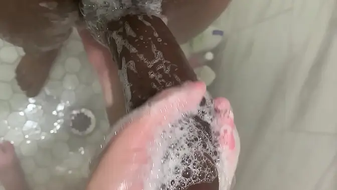 Young Asian teen gives hand job to stepbrother's big dick