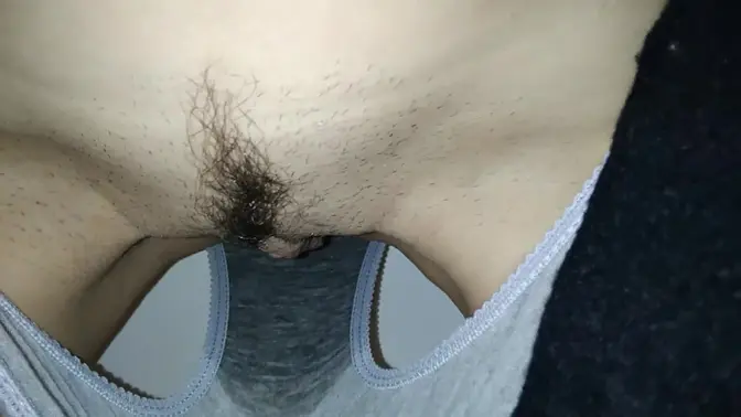 Young girl pees in gray panties
